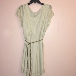 Cream colored dress with thin tan belt